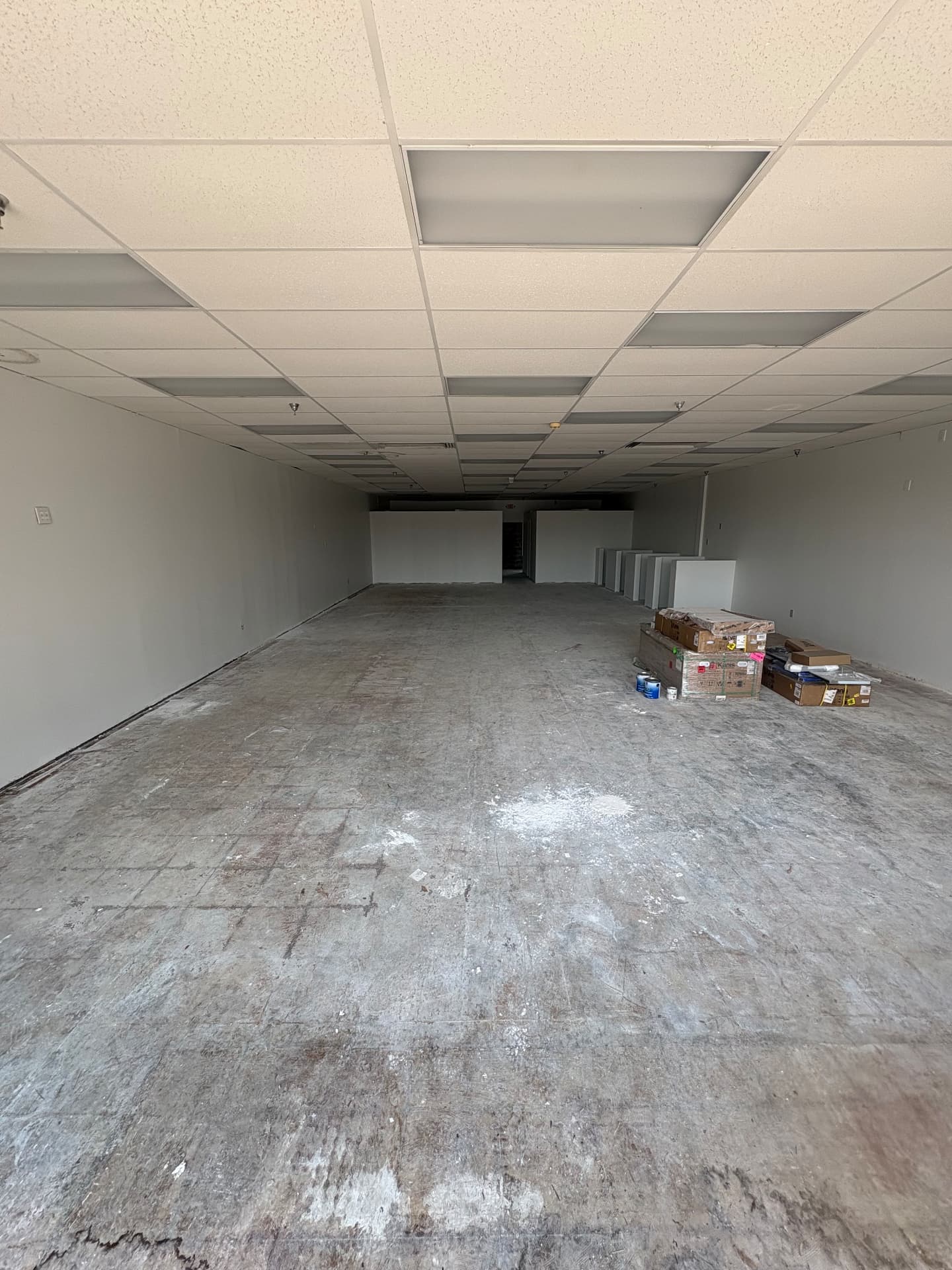 Commercial retail space before floor coating prep